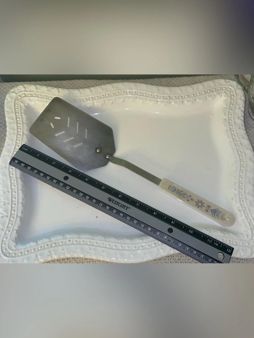 Vintage Ace kitchen spatula turner with decorative blue folk art handle